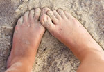 Sandy feet from a seaside holiday